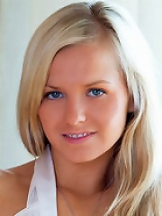 Bella C rubs her large natural tan breasts just before making herself cum with her new glass dildo