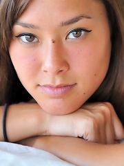 Miyu shows off her shaved pussy